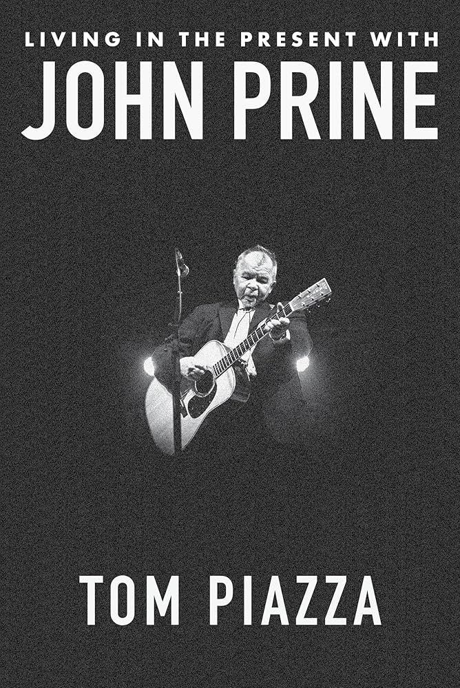 JOHN PRINE - LIVING IN THE PRESENT WITH JOHN PRINE - HARDCOVER - BOOK